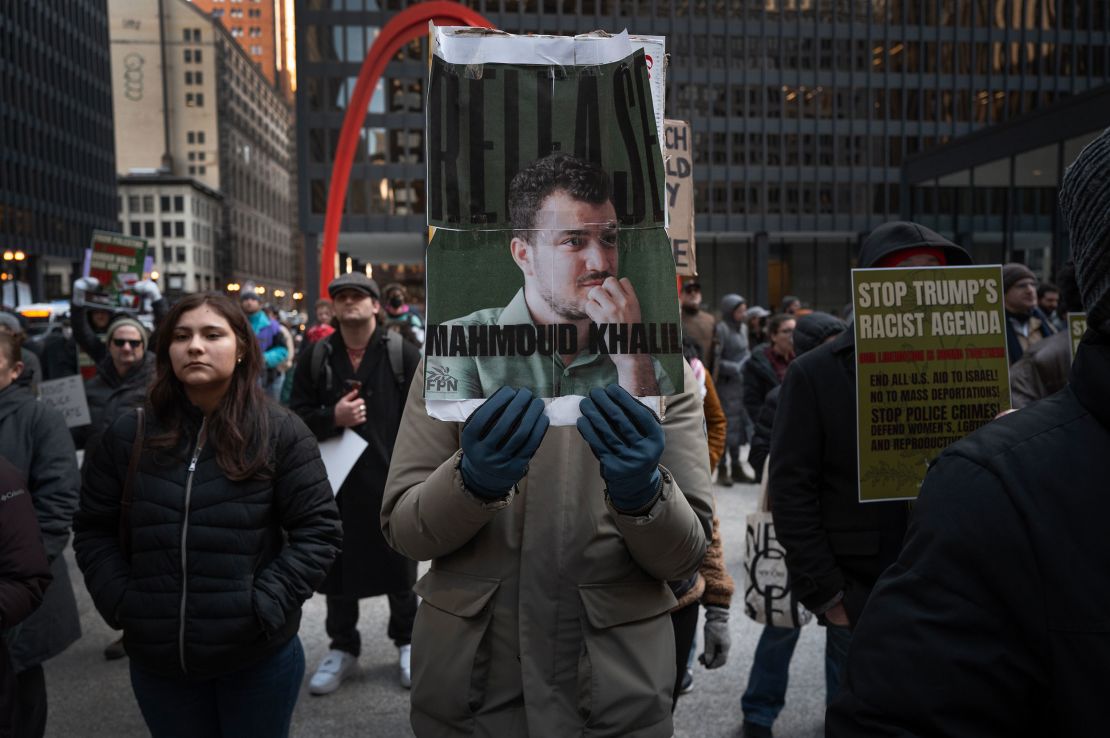 Activists hold a rally and march through downtown Chicago to show support for Mahmoud Khalil on March 11.