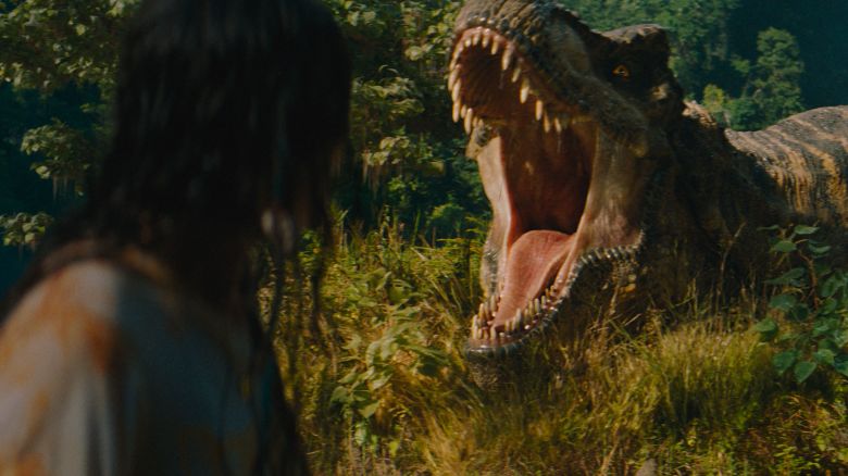 L to R: Luna Blaise and the T-Rex in JURASSIC WORLD REBIRTH, directed by Gareth Edwards