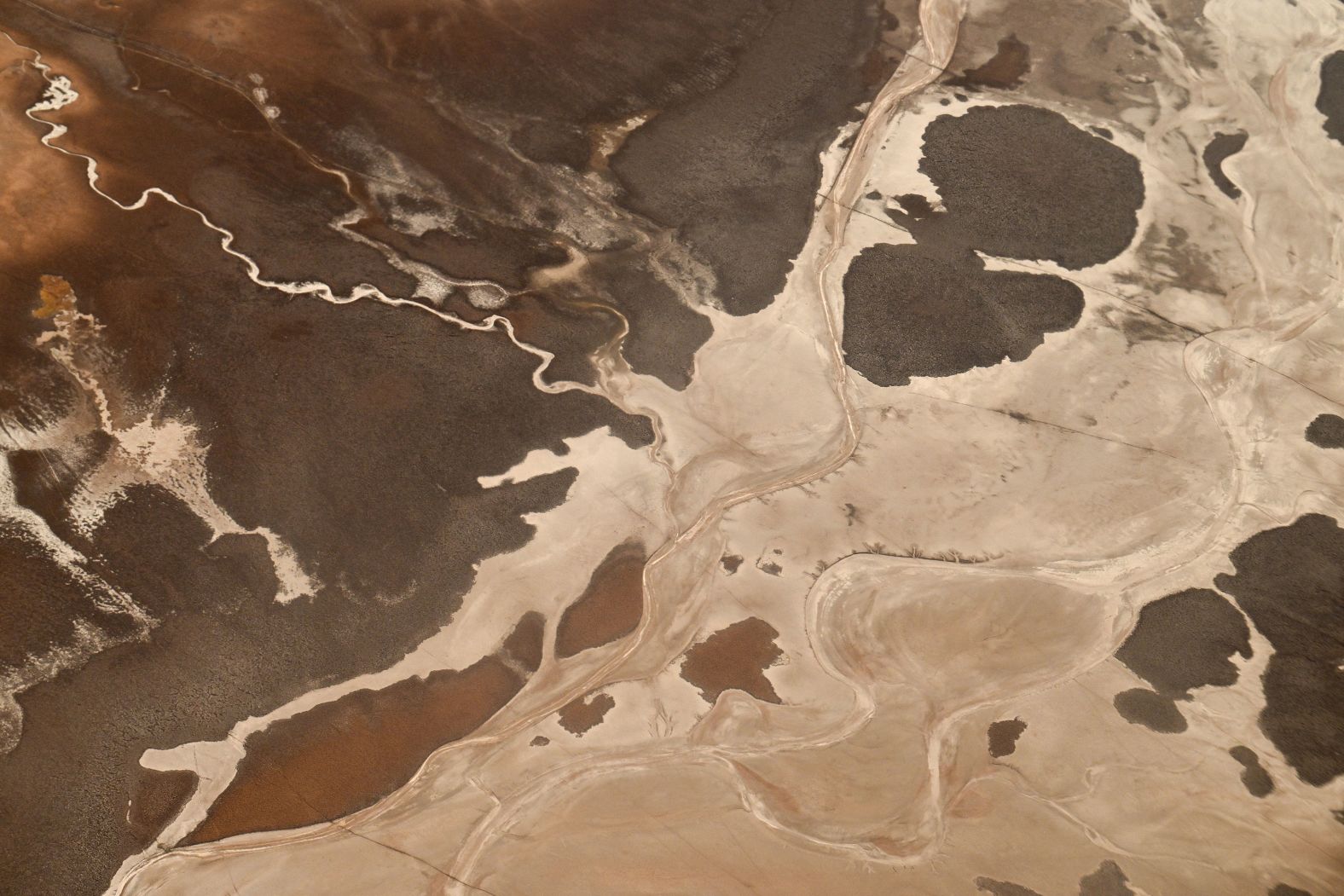 This aerial photo, taken Thursday, July 4, shows the Salar Centenario Ratones in Argentina’s Salta province. French mining group Eramet and China's Tsingshan just inaugurated a lithium production plant there to supply the booming electric car industry. <a href="index.php?page=&url=https%3A%2F%2Fwww.cnn.com%2F2024%2F07%2F04%2Fworld%2Fgallery%2Fthe-week-in-39-photos%2Findex.html">See last week in 39 photos</a>.