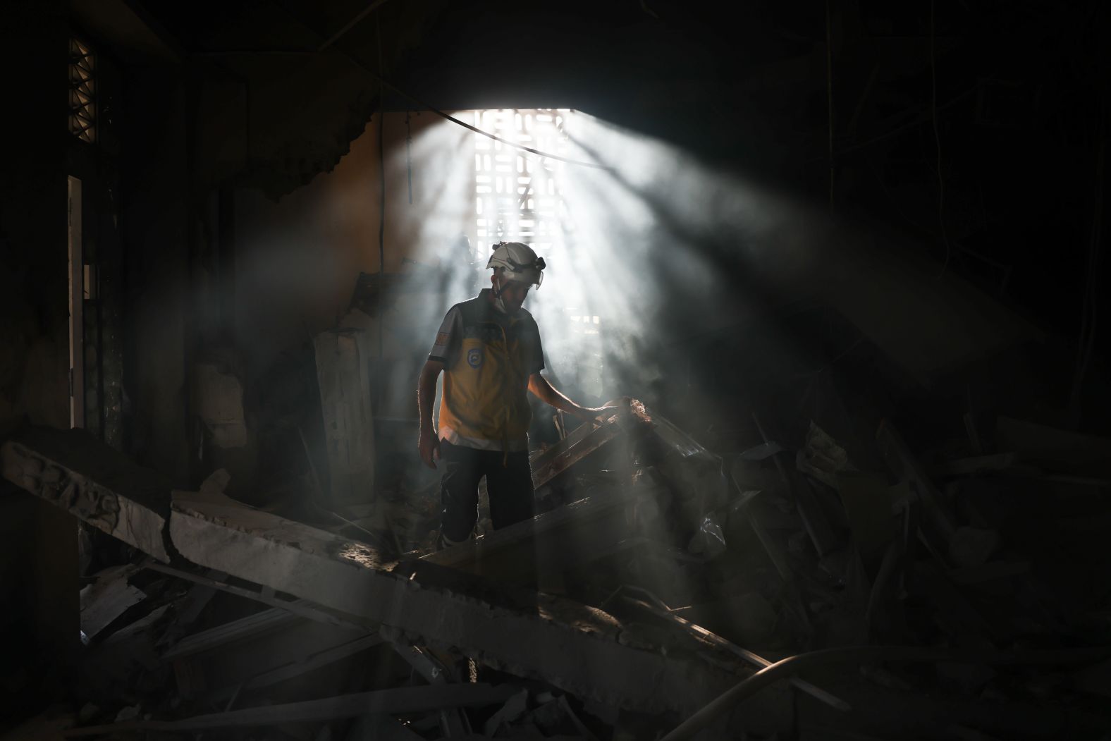 A member of Syria's civil defense works in the aftermath of an Israeli airstrike in Damascus, Syria, on Wednesday, July 16. Israel has been carrying out strikes on Syria since the fall of the Assad regime in December. This week saw <a href="index.php?page=&url=https%3A%2F%2Fwww.cnn.com%2F2025%2F07%2F15%2Fmiddleeast%2Fisrael-strikes-syria-sectarian-clashes-druze-intl">a major escalation</a>, when Israel said it attacked Syria to protect the Druze, an Arab minority at the center of clashes with government loyalists.