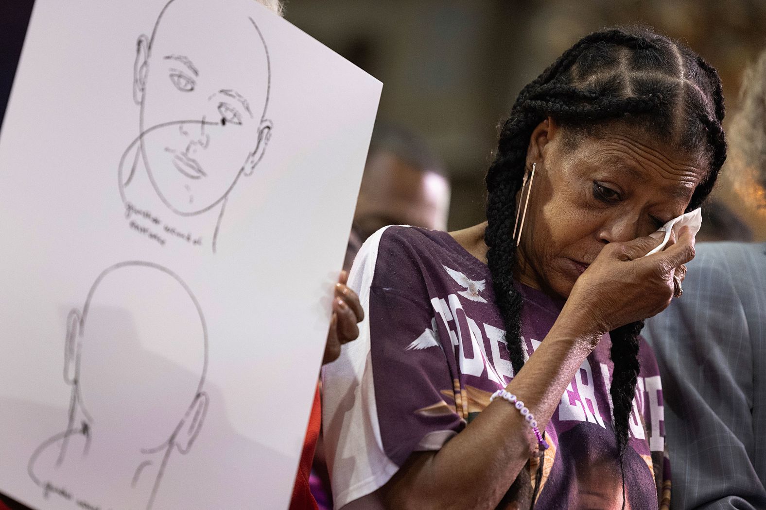 Donna Massey, the mother of Sonya Massey, wipes away tears during a news conference in Chicago on Tuesday, July 30. A Sangamon County sheriff’s deputy <a href="index.php?page=&url=https%3A%2F%2Fwww.cnn.com%2F2024%2F07%2F30%2Fus%2Fsonya-massey-shooting-community-meeting-sheriff%2Findex.html">was charged last month</a> with fatally shooting Sonya Massey, 36, after she called 911 to report a possible “prowler” at her home near Springfield, according to a court document filed by prosecutors. After two deputies went to the home to investigate, one of them shot and killed her following a dispute involving a pot of hot water, authorities said. That deputy, Sean Grayson, has since been fired, and he has entered a not guilty plea, according to court records.