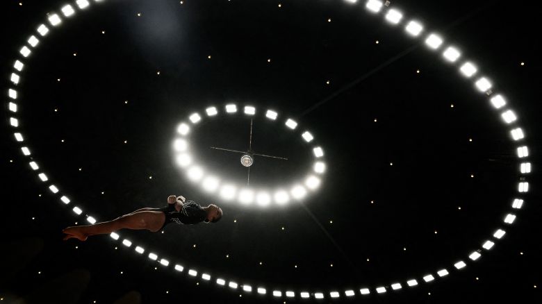 TOPSHOT - France's Melanie De Jesus Dos Santos competes during the women's 2024 French Gymnastics Championships, in Lyon on June 7, 2024. (Photo by JEFF PACHOUD / AFP) (Photo by JEFF PACHOUD/AFP via Getty Images)