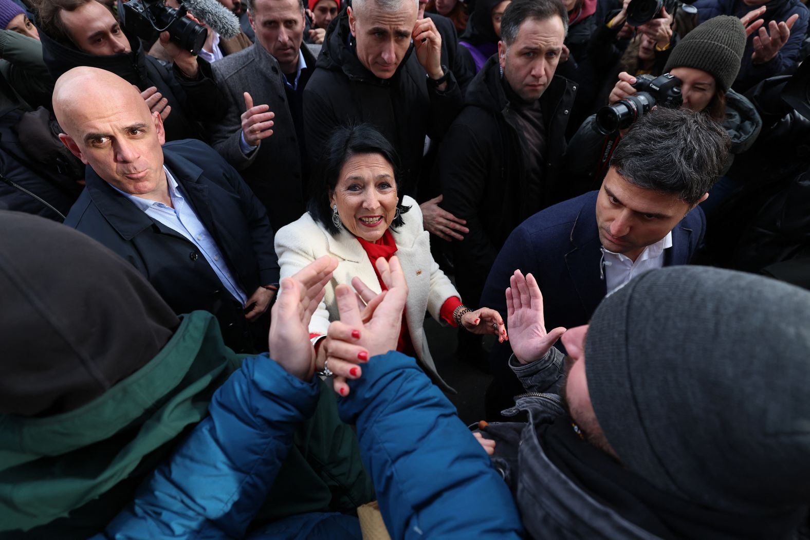 Georgia's outgoing president, Salome Zurabishvili, is greeted during a meeting ahead of President-elect <a href="index.php?page=&url=https%3A%2F%2Fwww.cnn.com%2F2024%2F12%2F29%2Feurope%2Fgeorgia-president-kavelashvili-inaugurated-intl%2Findex.html">Mikheil Kavelashvili's inauguration</a> in Tbilisi on Sunday, December 29. Zourabichvili is a pro-Western opponent of the ruling party. Kavelashvili is a hardline critic of the West.