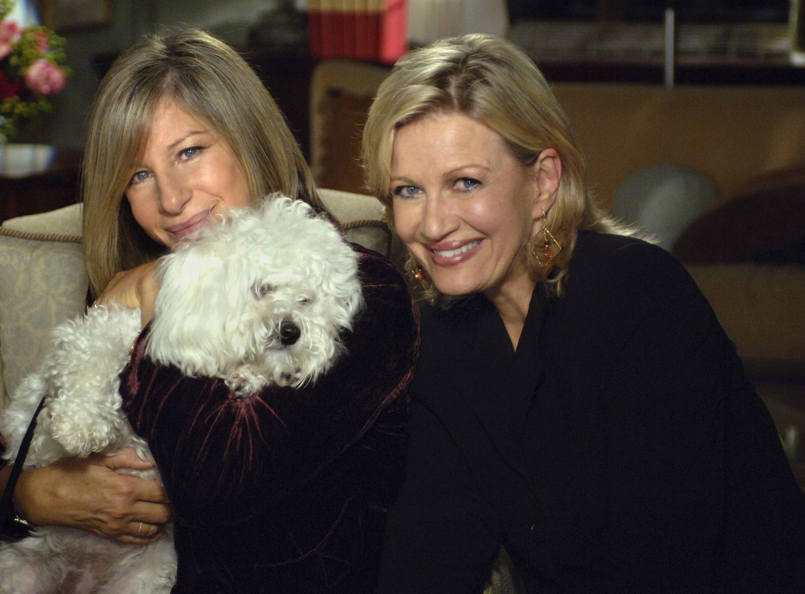 Streisand holds her dog Samantha while on set for an interview with Diane Sawyer in 2005. Streisand <a href="index.php?page=&url=https%3A%2F%2Fvariety.com%2F2018%2Ffilm%2Fnews%2Fbarbra-streisand-oscars-sexism-in-hollywood-clone-dogs-1202710585%2F" target="_blank">revealed to Variety Magazine</a> in 2018 that two of her dogs were cloned using Samantha's cells.