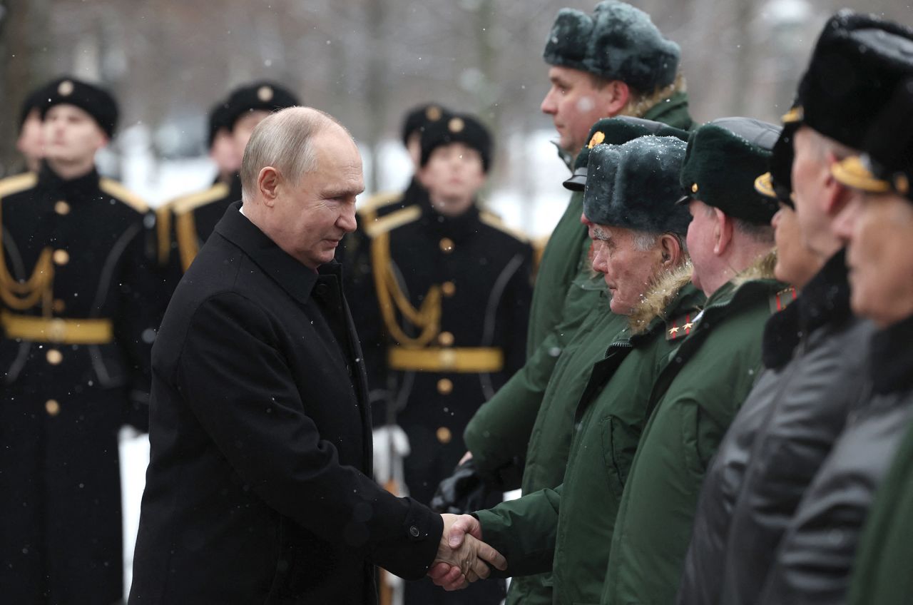 Russia's President Vladimir Putin attends a wreath-laying ceremony at the Tomb of the Unknown Soldier by the Kremlin Wall to mark the Defender of the Fatherland Day in Moscow, Russia, on February 23.