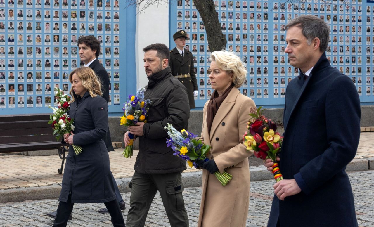 Canadian Prime Minister Justin Trudeau, Italian Prime Minister Giorgia Meloni, Ukrainian President Volodymyr Zelensky, European Commission President Ursula von der Leyen and Belgian Prime Minister Alexander De Croo visit the Wall of Memory in Kyiv, Ukraine, on February 24. 