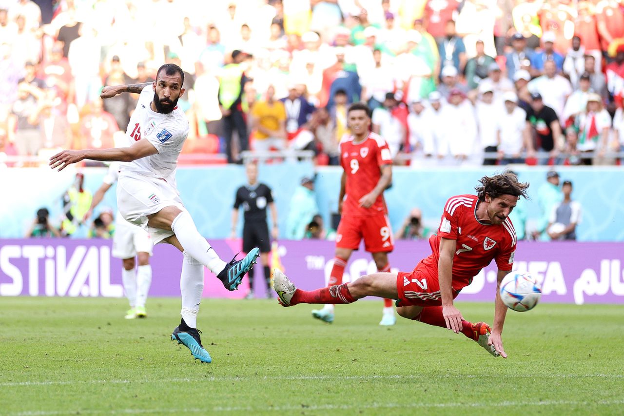 Roozbeh Cheshmi of IR Iran scores their team's first goal during the FIFA World Cup Qatar 2022 Group B match between Wales and IR Iran at Ahmad Bin Ali Stadium on November 25.