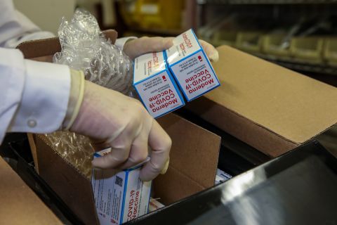Dr. Sean McElligott pulls out boxes containing the Moderna Covid-19 vaccine at Seton Medical Center on Tuesday, December 22, 2020, in Daly City, near San Francisco, California.