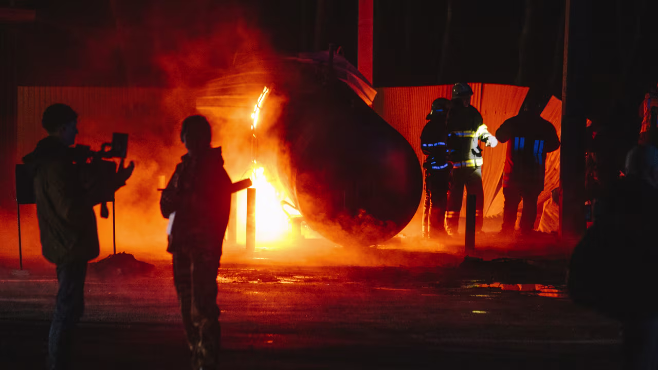 A tank burns at a gas station after a Russian attack in Kharkiv, Ukraine, on April 22. 