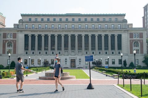 People wearing masks are seen on at Columbia University as the city continues Phase 4 of re-opening following restrictions imposed to slow the spread of coronavirus on August 6, in New York.
