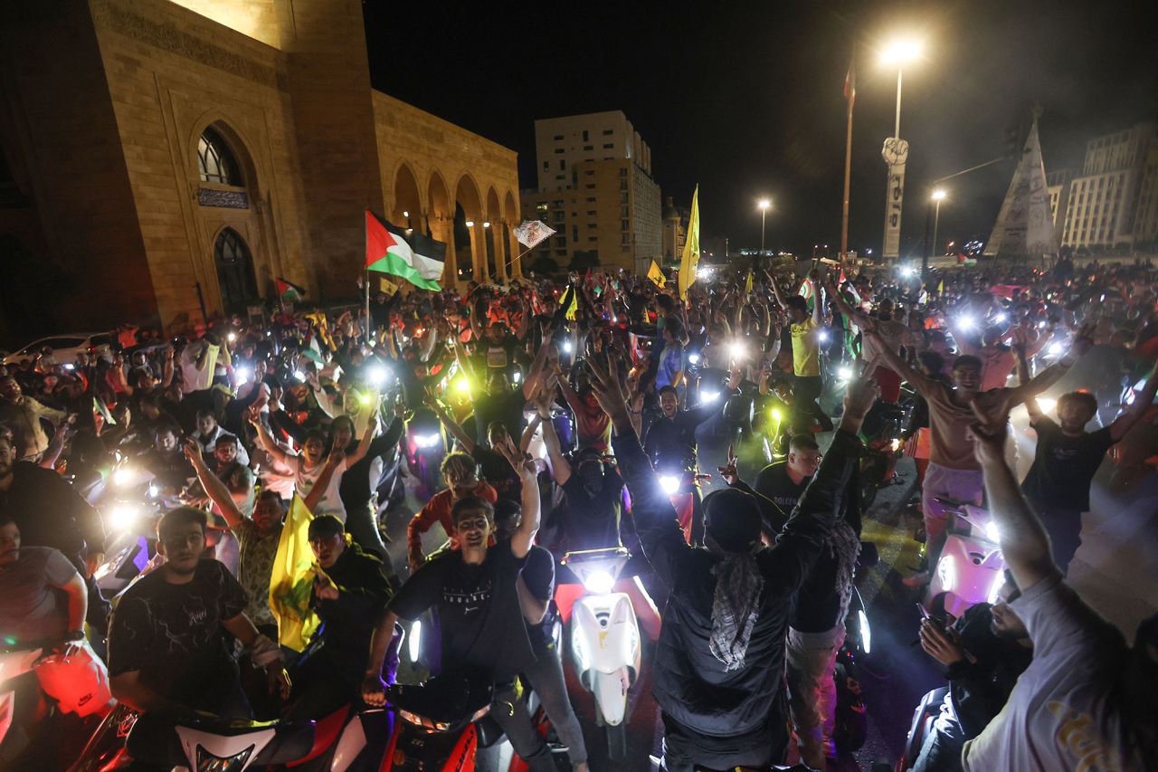 Lebanese protesters wave Palestinian national flags and shout slogans in solidarity with the people of Gaza in down town Beirut, Lebanon, on October 17.