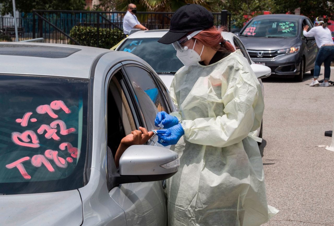 Medical staff from myCovidMD provide free COVID-19 virus antibody testing at the Faith Central Bible Church in Inglewood, California on June 19.