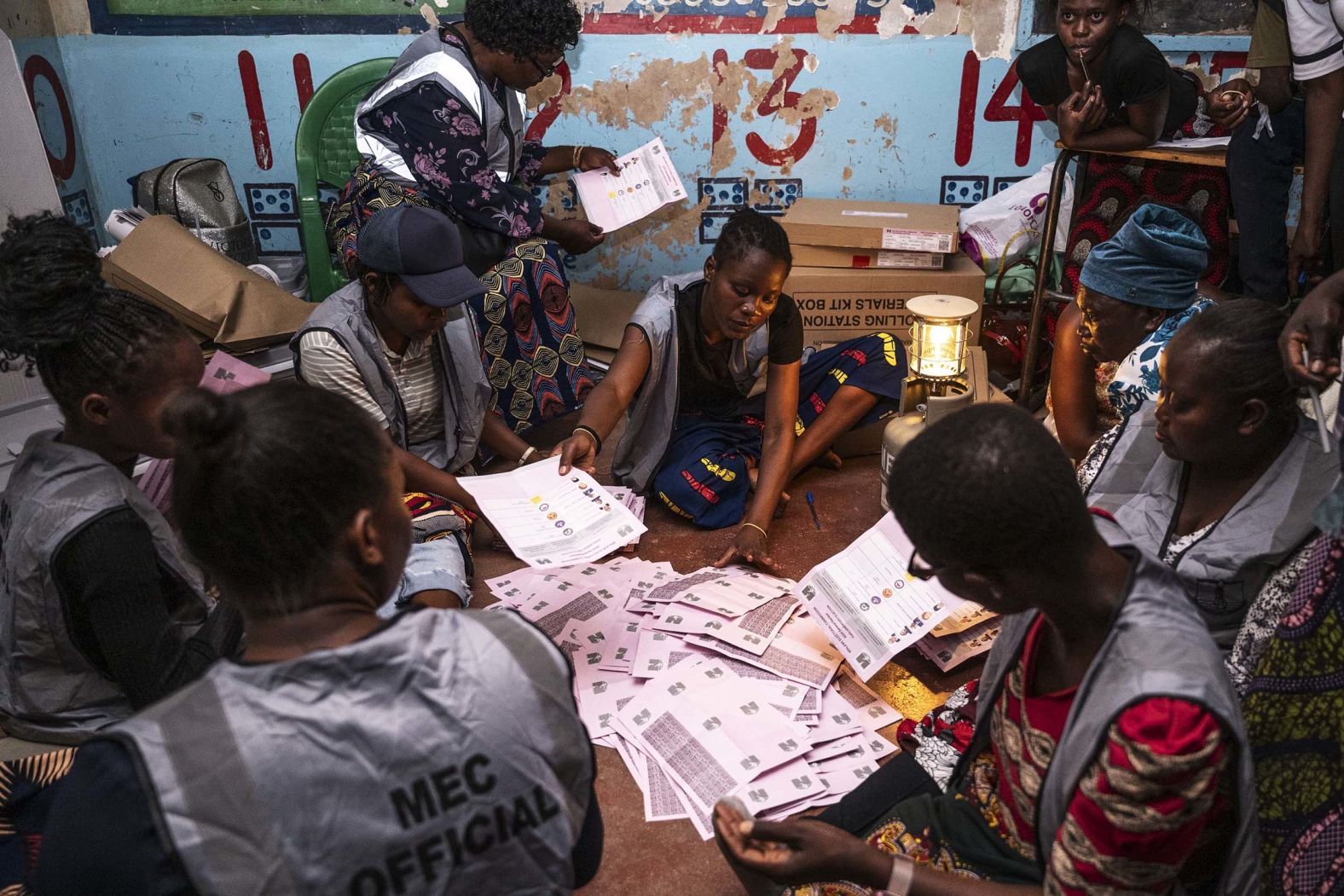 Election volunteers count ballots in Blantyre, Malawi, on Tuesday, September 16.