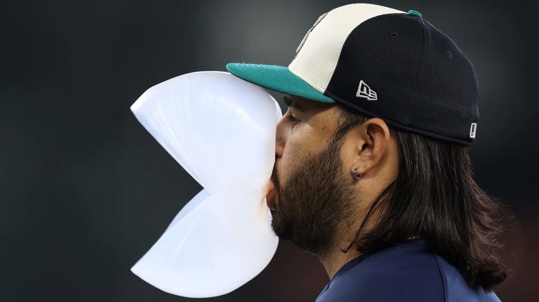 SEATTLE, WASHINGTON - OCTOBER 10:  Eugenio Suárez #28 of the Seattle Mariners takes batting practice prior to game five of the American League Division Series against the Detroit Tigers at T-Mobile Park on October 10, 2025 in Seattle, Washington. (Photo by Steph Chambers/Getty Images)

Austin