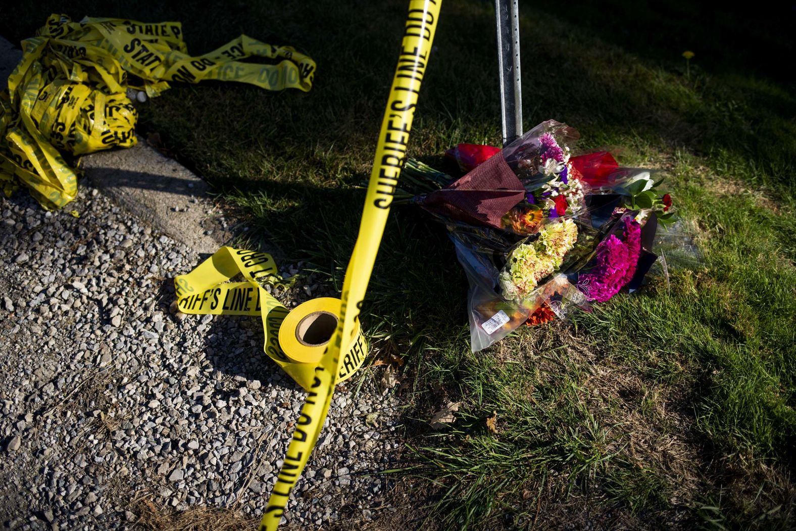 A makeshift memorial sits on the street next to police tape near the Church of Jesus Christ of Latter-day Saints in Grand Blanc, Michigan, on Monday, September 29. <a href="index.php?page=&url=https%3A%2F%2Fwww.cnn.com%2F2025%2F09%2F29%2Fus%2Fhow-shooting-fire-michigan-church-unfolded">Sunday’s attack</a>, which is among more than 320 mass shootings this year so far in the US, is being investigated as an act of targeted violence by the FBI.