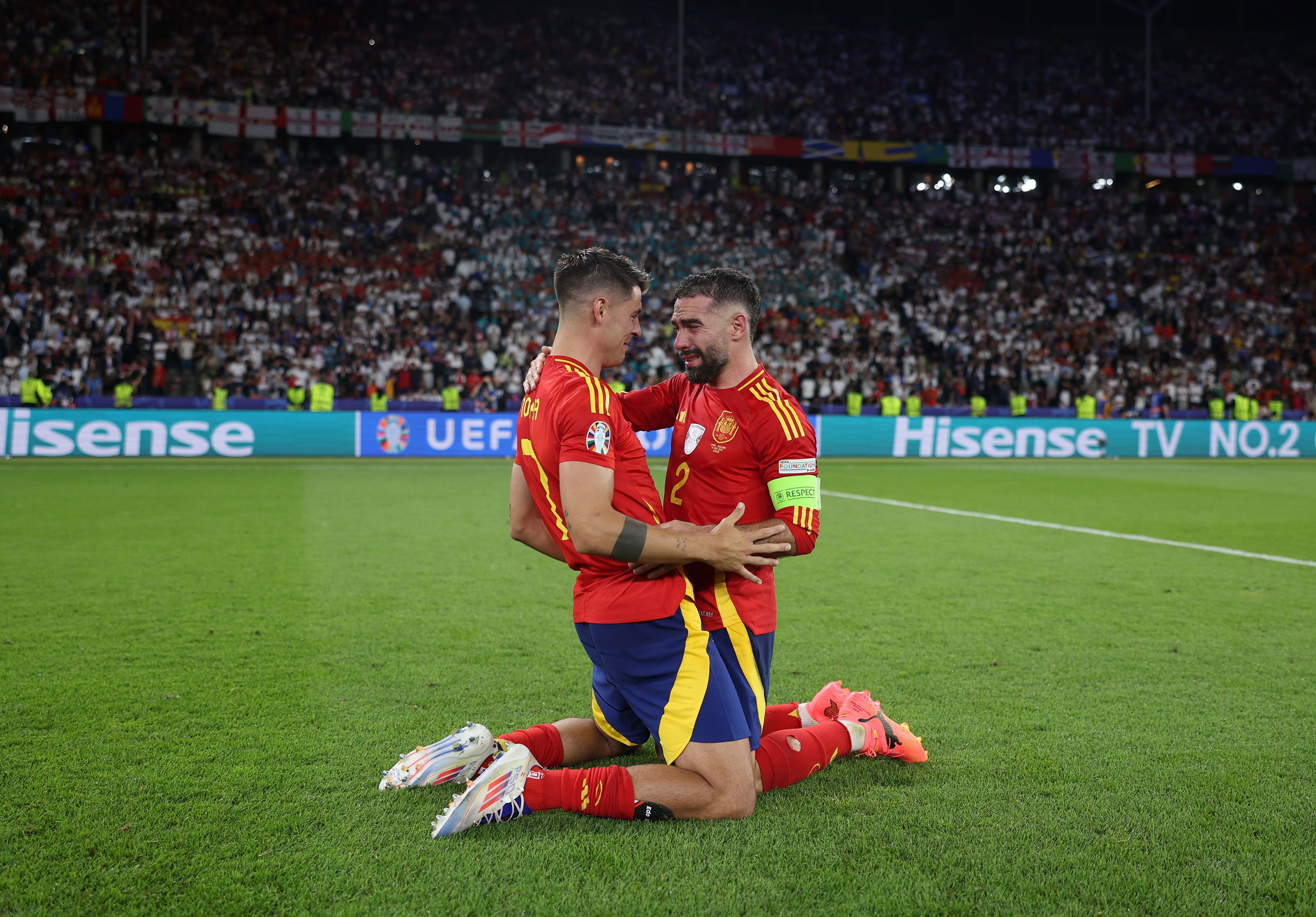 Álvaro Morata, left, and Dani Carvajal celebrate after <a href="https://www.cnn.com/2024/07/14/sport/spain-england-euro-2024-final-spt-intl/index.html">Spain defeated England 2-1</a> to win its record-breaking fourth European Championship on Sunday, July 14.