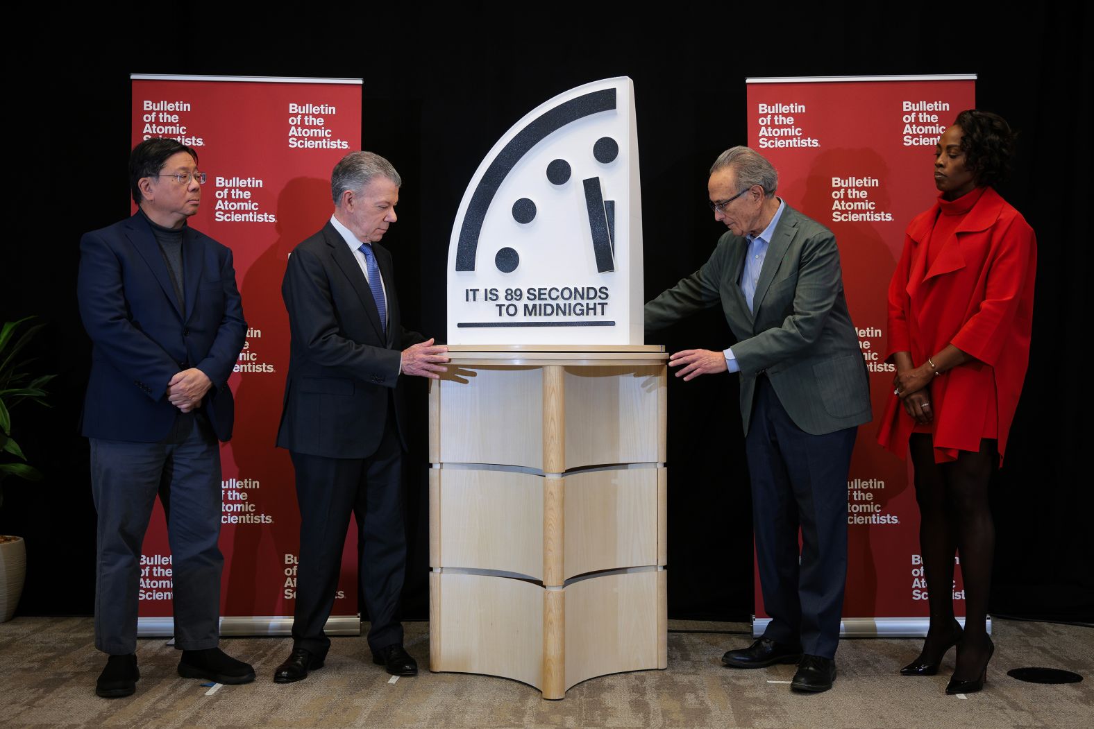 From left, Herbert Lin, Juan Manuel Santos, Robert Socolow and Suzet McKinney reveal <a href="index.php?page=&url=https%3A%2F%2Fwww.cnn.com%2F2025%2F01%2F28%2Fscience%2Fdoomsday-clock-2025-time-wellness%2Findex.html">an updated Doomsday Clock</a> at the United States Institute of Peace in Washington, DC, on Tuesday, January 28. The clock was set at 89 seconds to midnight — the closest the world has ever been to that marker, according to the Bulletin of the Atomic Scientists, which established the clock in 1947 as a symbolic attempt to gauge how close humanity is to destroying the world.