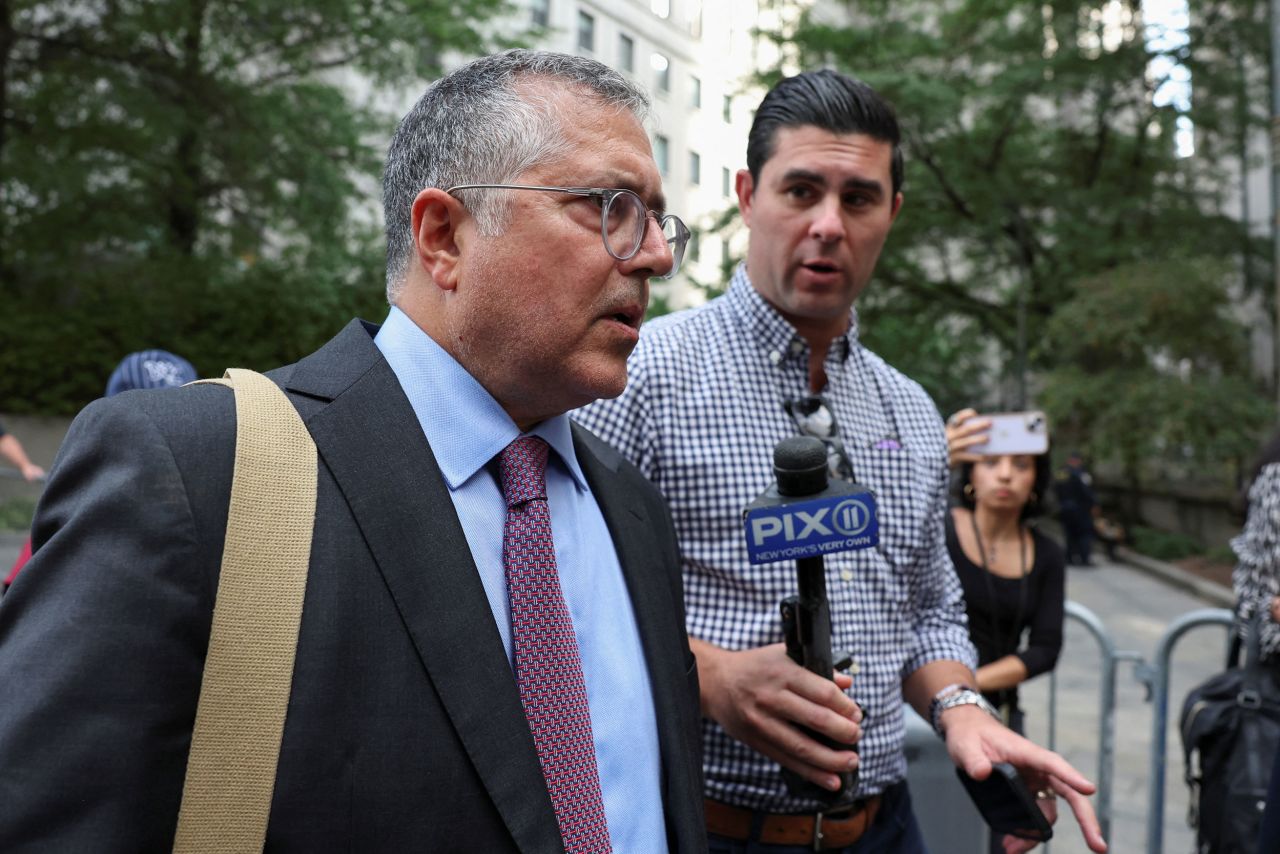 Attorney Marc Agnifilo speaks to the press outside court in New York on Tuesday. 