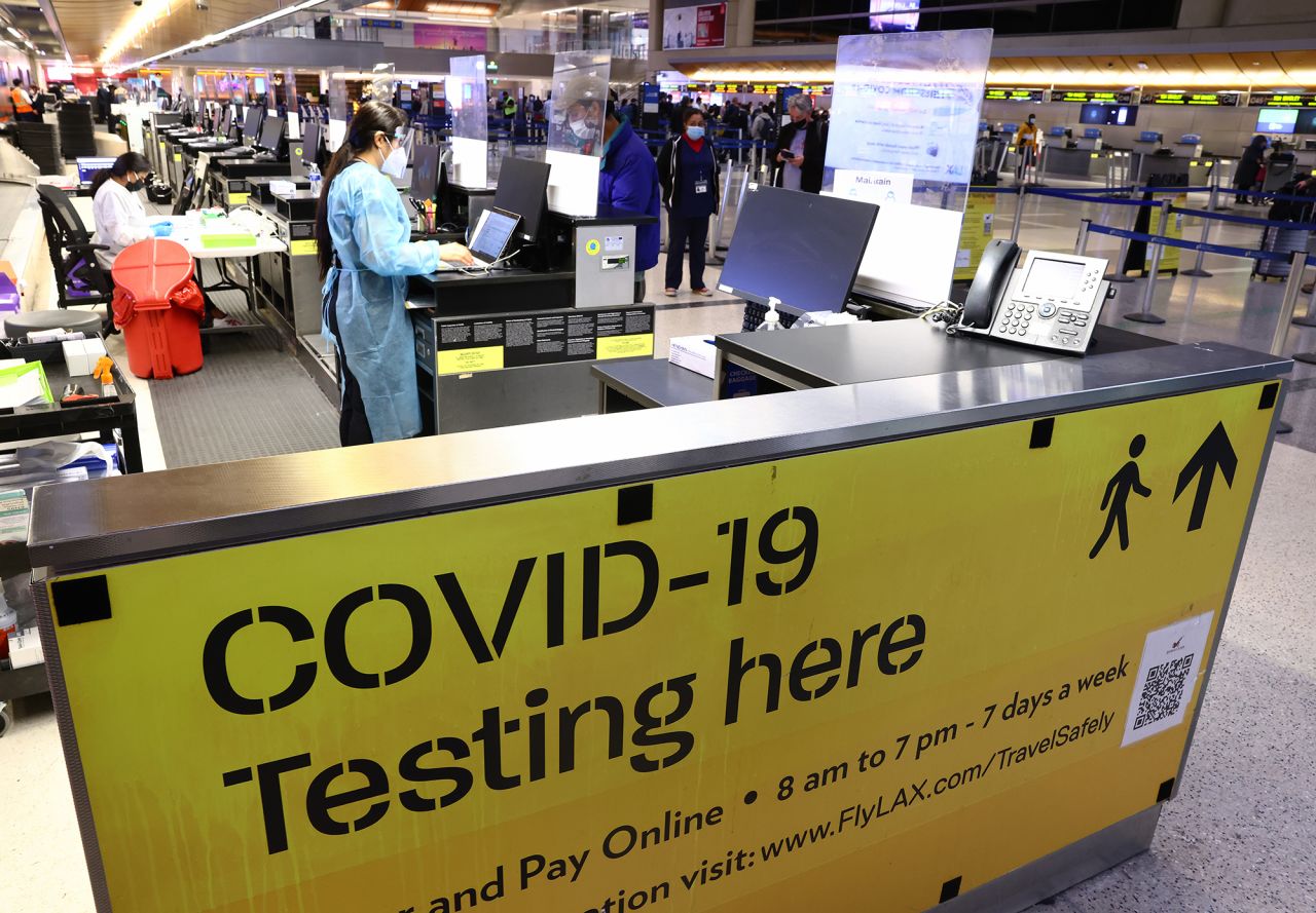 A COVID-19 test center operates inside the Tom Bradley International Terminal at Los Angeles International Airport (LAX) on December 01, 2021 in Los Angeles, California. The Biden administration is planning to announce tighter restrictions for travelers flying into the United States, including requiring a negative test for COVID-19 one day ahead of travel, in response to the new Omicron variant.?