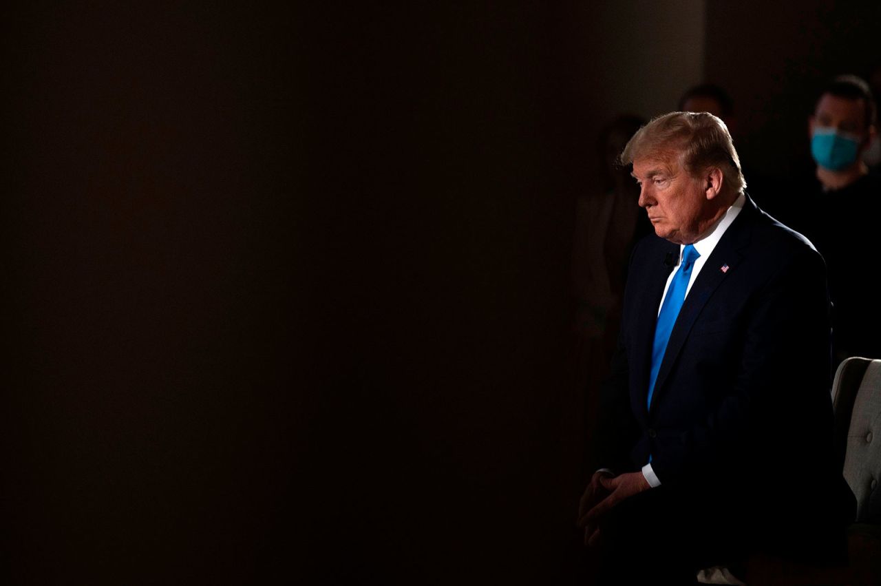 US President Donald Trump sits during a commercial break of a Fox News virtual town hall at the Lincoln Memorial on May 3.