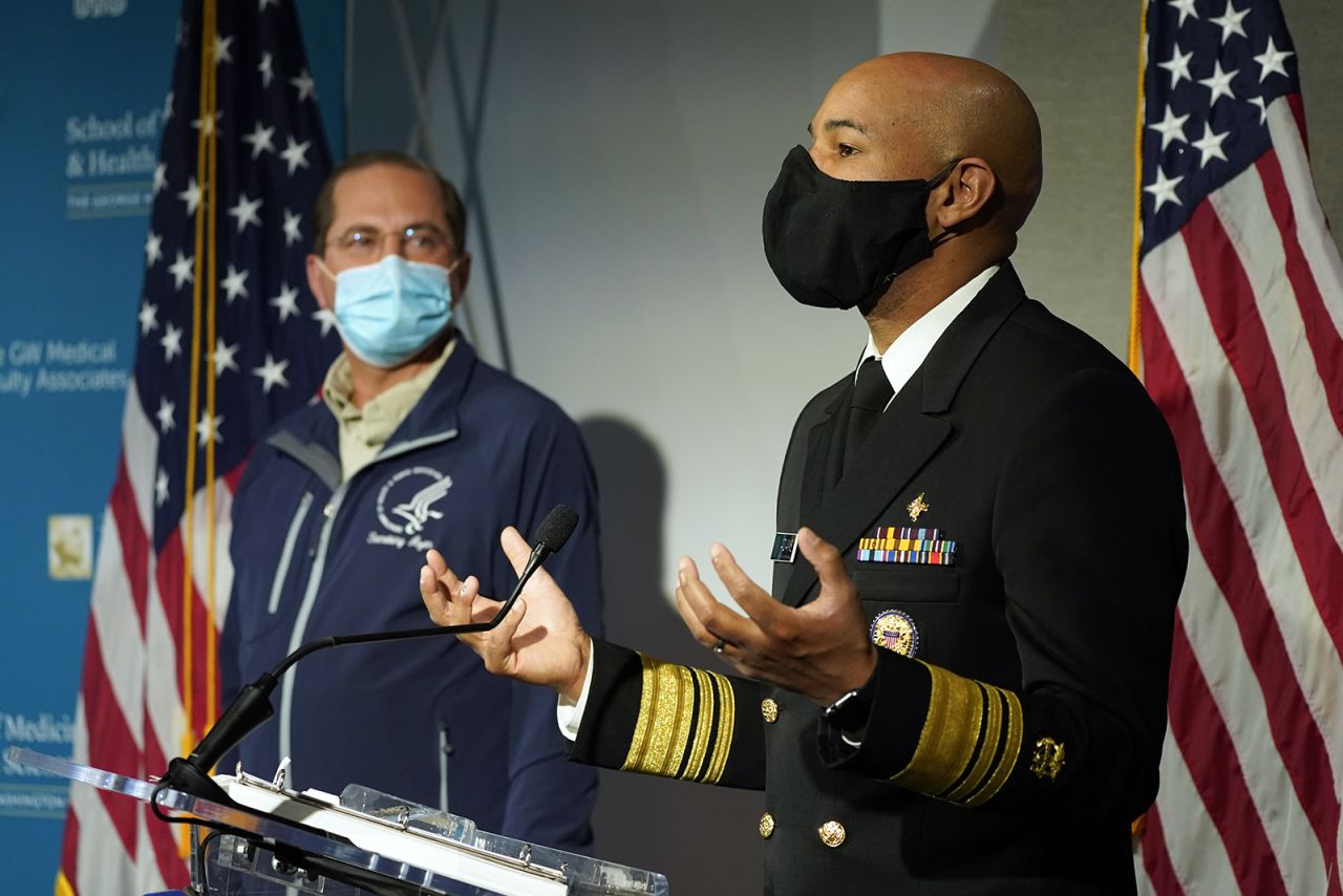 U.S. Surgeon General Dr. Jerome Adams speaks at George Washington University Hospital on Monday, December 14, in Washington.