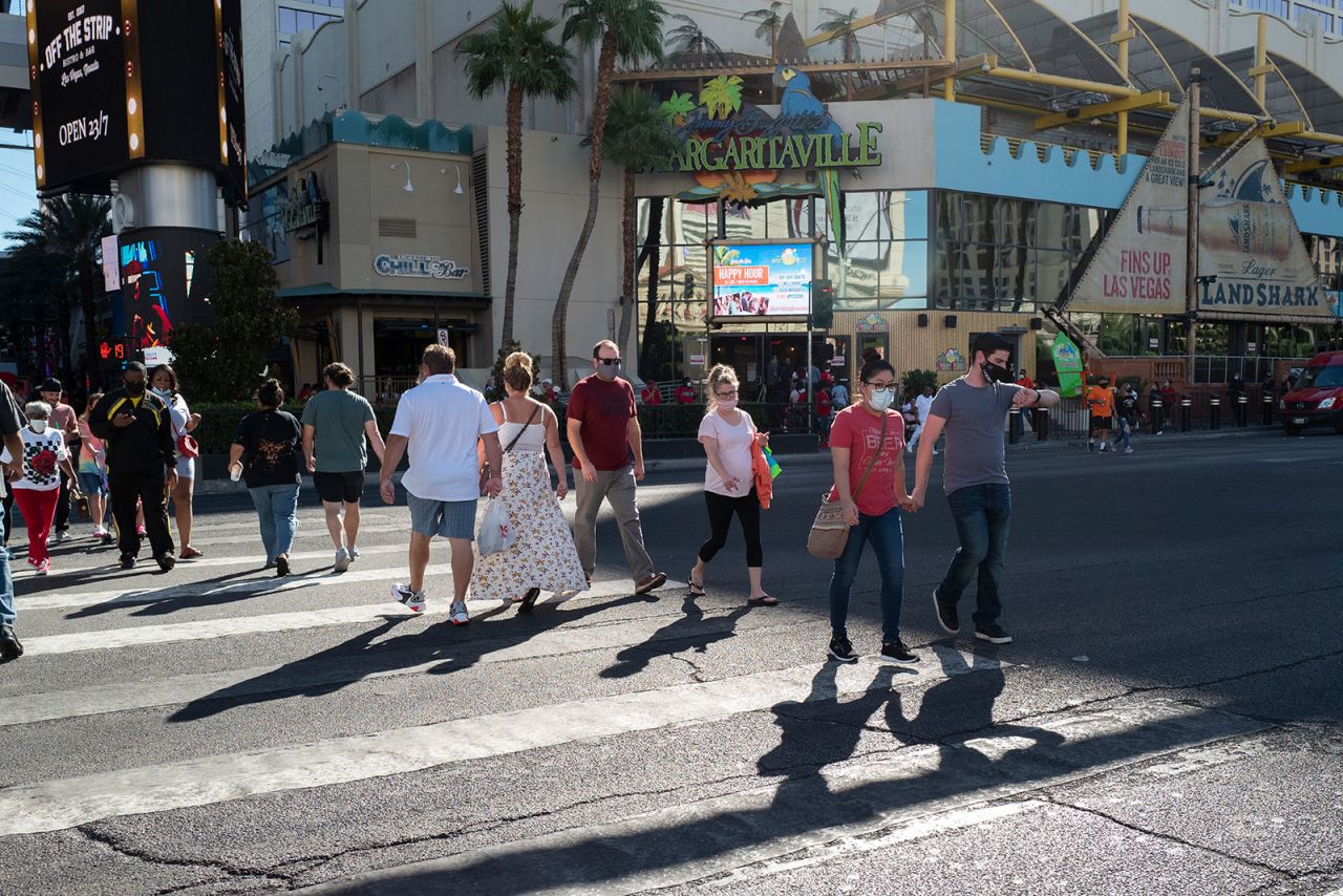 People wear masks while walking in Las Vegas, Nevada, in October.