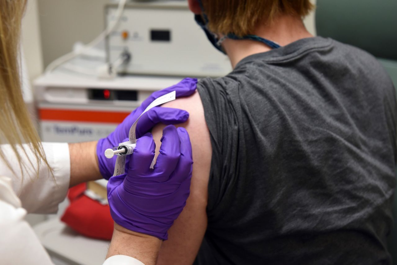 A patient receives an injection as a part of Pfizer's COVID-19 coronavirus vaccine clinical trial at the University of Maryland School of Medicine in Baltimore, Maryland on May 4.