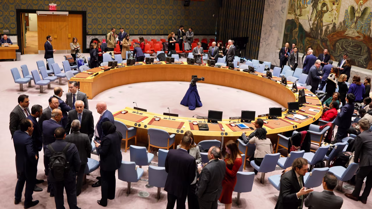 Members of the UN Security Council hold sideline meetings as they take a break at the UN headquarters in New York on Tuesday.
