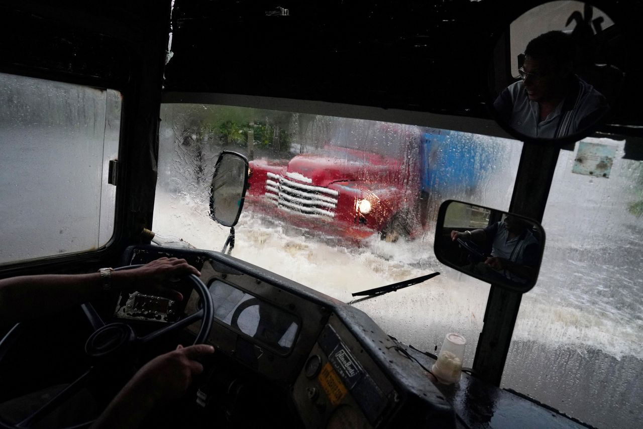 A truck passes by on a flooded street in Guanimar, Cuba, on M August 28, 2023. REUTERS/Alexandre Meneghini 