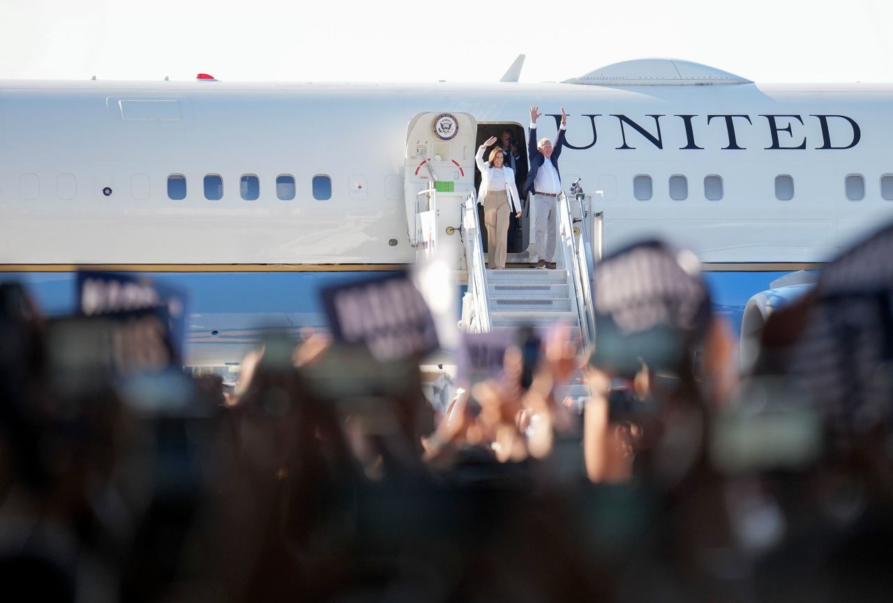 Vice President Kamala Harris and Democratic vice presidential nominee Gov. Tim Walz deplane ahead of a rally at the Detroit Metropolitan Wayne County Airport in Romulus, Michigan, on August 7. 