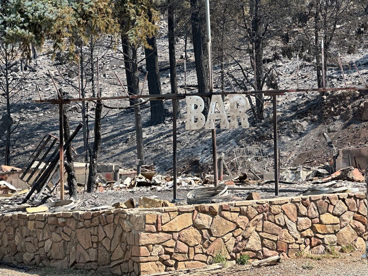 Alto Ski Shop Bar is seen after the wildfires passed through on Wednesday. 