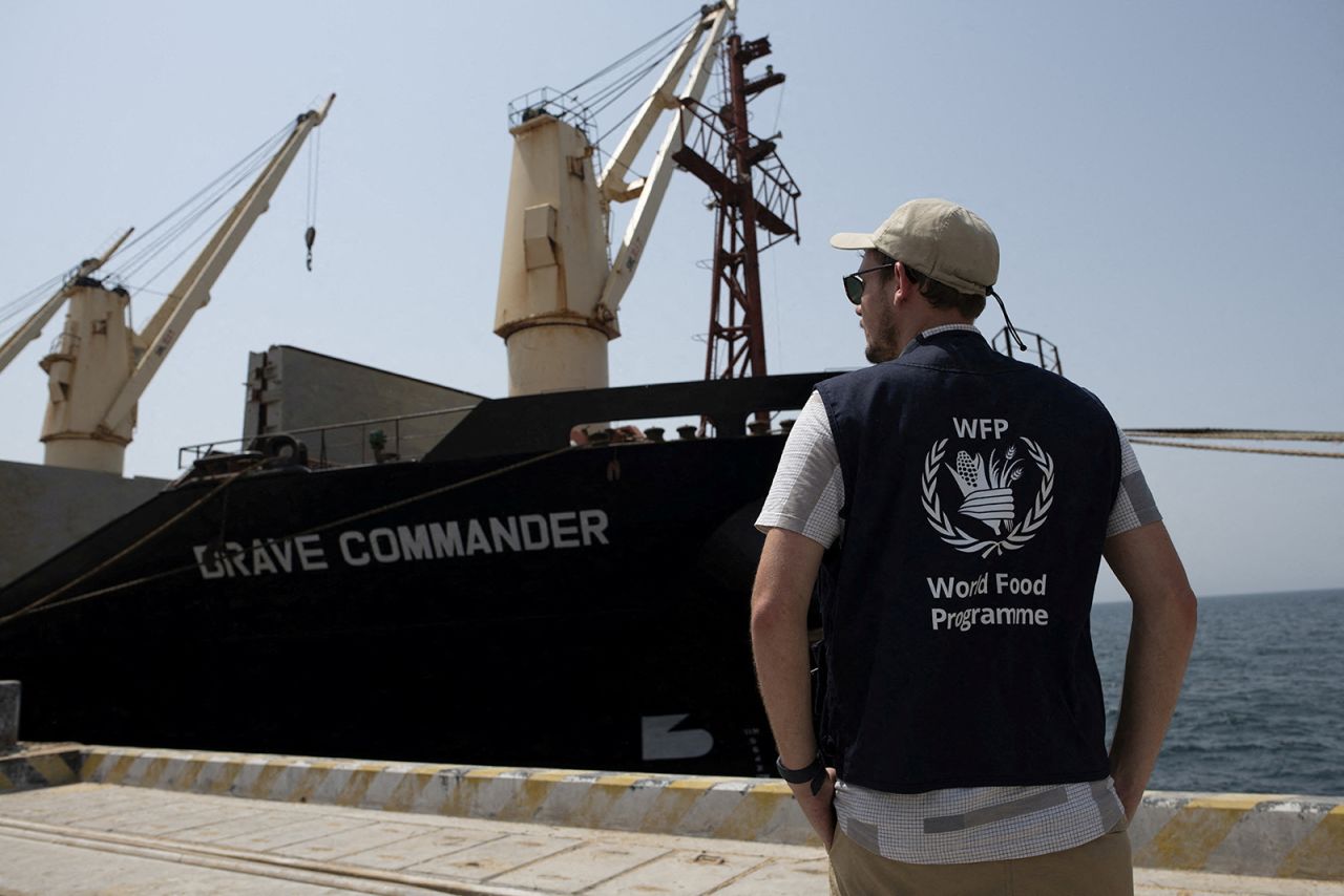 A World Food Programme staff stands near the?MV?Brave?Commander?carrying?wheat?grain?from?Yuzhny?Port?in Ukraine to the Horn of Africa docks in Djibouti on August 30.