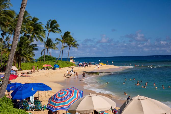 <strong>7. Poipu Beach, Kauai, Hawaii. </strong>On the sunny side of Kauai, two beaches are separated by a tombolo — a narrow sand spit that extends from the shore to an island.