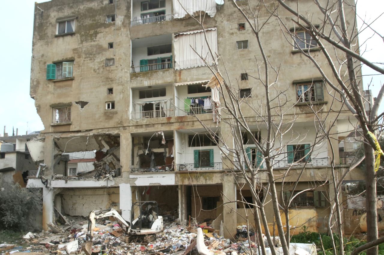 A picture shows the damages to a building targeted overnight by an Israeli airstrike in the southern Lebanese city of Nabatieh on February 15.