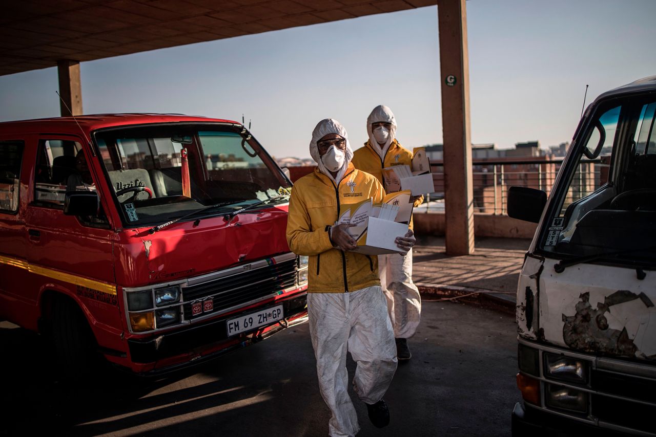 Scientology Volunteer Ministers distribute coronavirus information leaflets to taxi drivers in Newtown, Johannesburg, on Thursday, May 7.