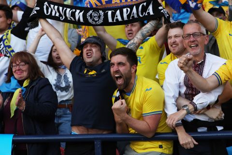 Ukraine fans celebrate after Andriy Yarmolenko of Ukraine scored their first goal during the FIFA World Cup playoff semifinal against Scotland at Hampden Park on June 1.