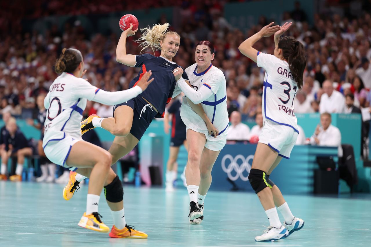 Norway’s Henny Reistad looks to shoot the ball against France in the women’s handball final on Saturday, August 10. 