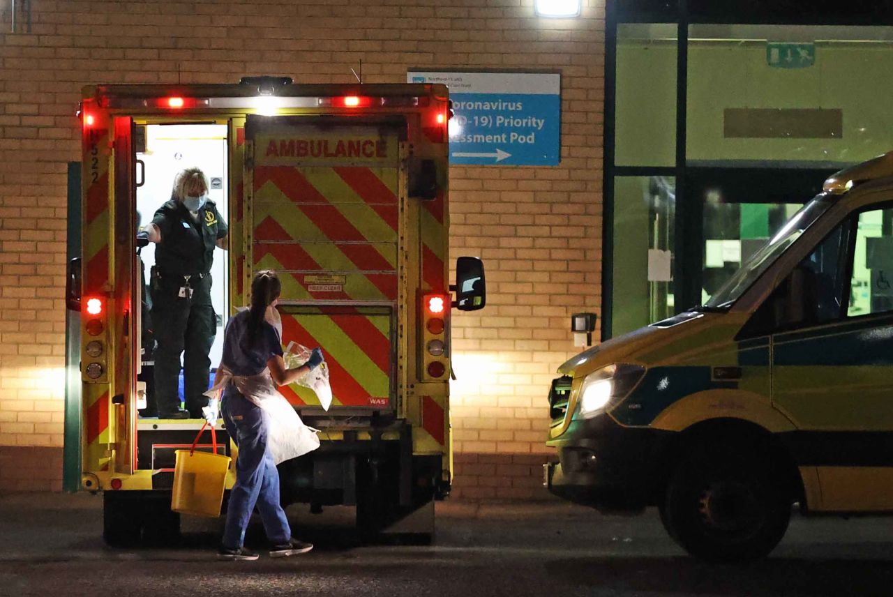 Medical staff attend to a patient in an ambulance at Antrim Area Hospital in Northern Ireland on Tuesday, December 15.