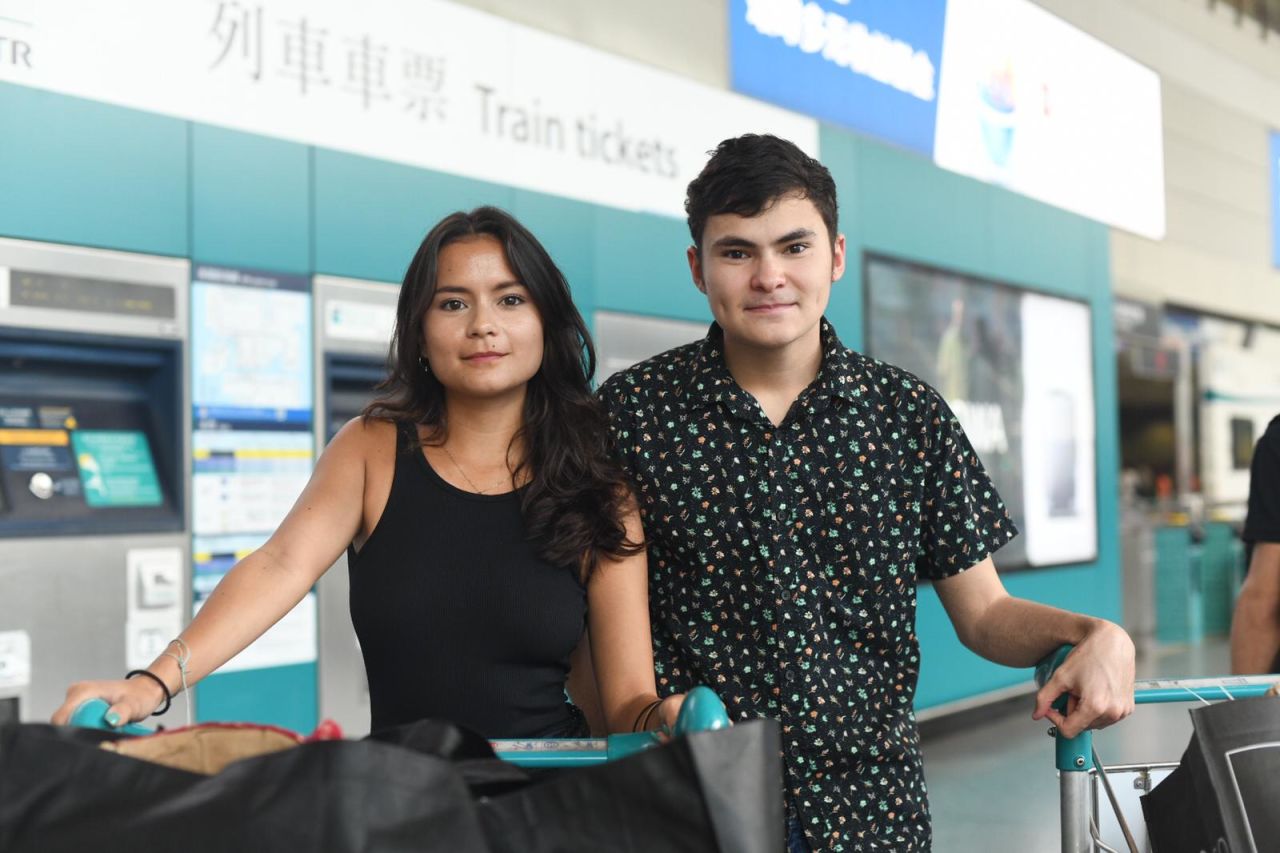 Meagan and Justin Scantlebury, Hong Kongers who are studying abroad and heading to the airport.