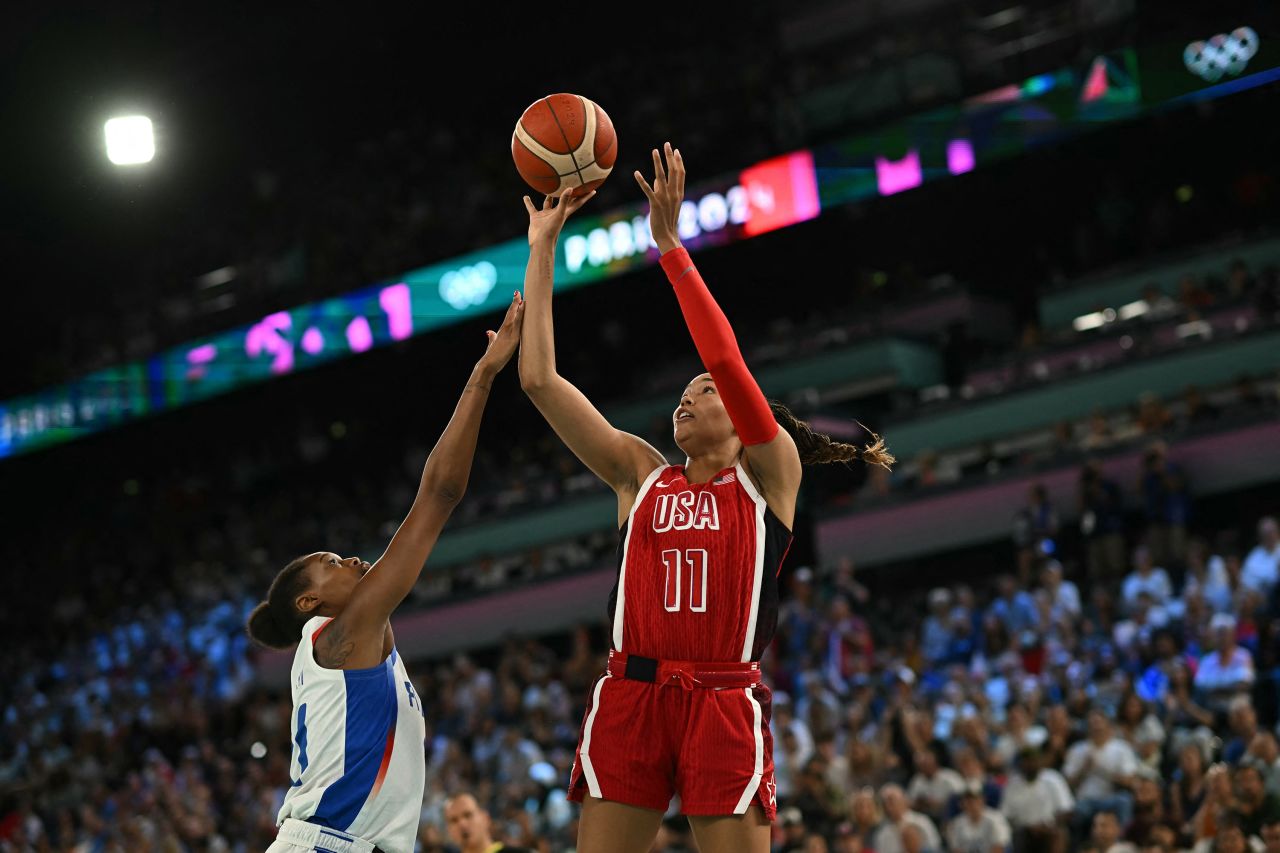 US basketball player Napheesa Collier takes a shot over France’s Valériane Ayayi during a game on August 11.