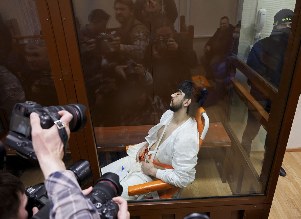 Suspect Muhammadsober Fayzov is pictured sitting in a medical transport chair during a hearing at the Basmanny district court in Moscow on March 25.