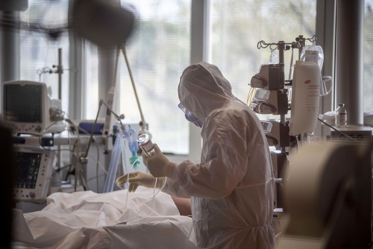 A doctor treats a coronavirus patient at a hospital in Rome, Italy, on March 21.