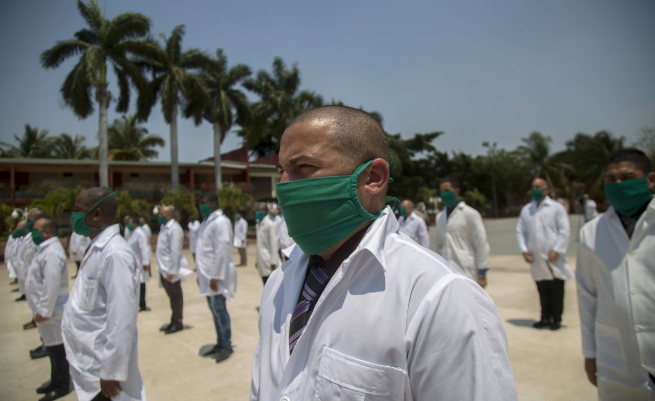 Cuban doctors attend a farewell ceremony in Havana, Cuba, on April 12 before leaving to help with the novel coronavirus outbreak in Italy.