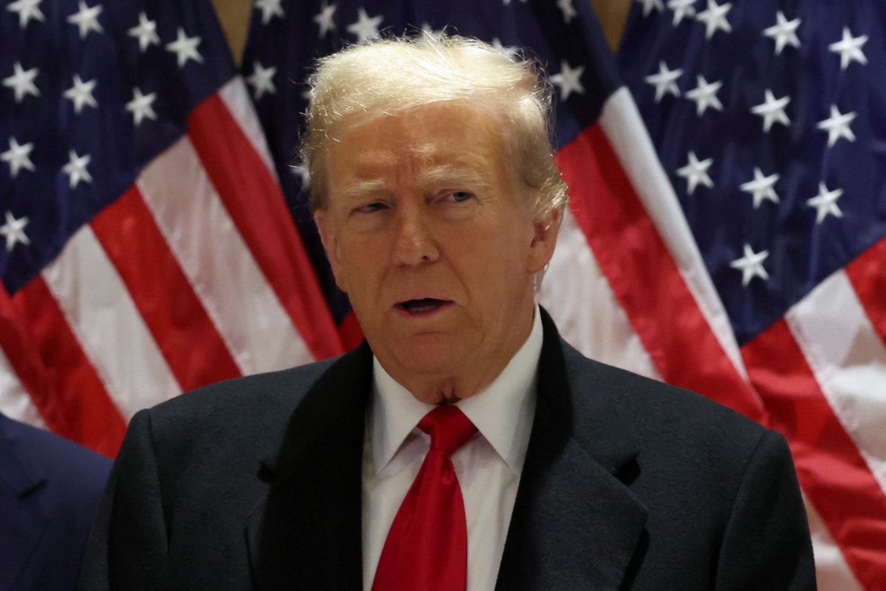 Former President Donald Trump speaks to the press in New York on Monday.