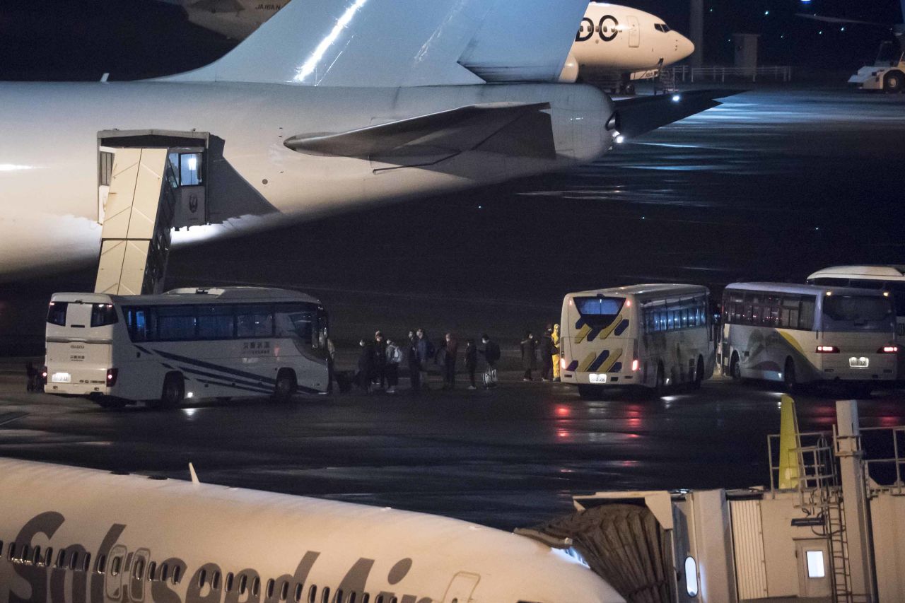 American citizens board a Kalitta Air aircraft, chartered by the U.S. government, at Haneda airport on February 17 in Tokyo, Japan.