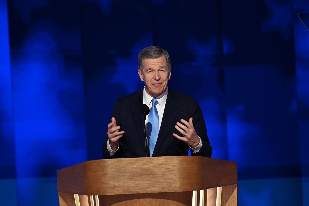 North Carolina Gov. Roy Cooper speaks on stage during the DNC in Chicago, on Thursday, August 22.