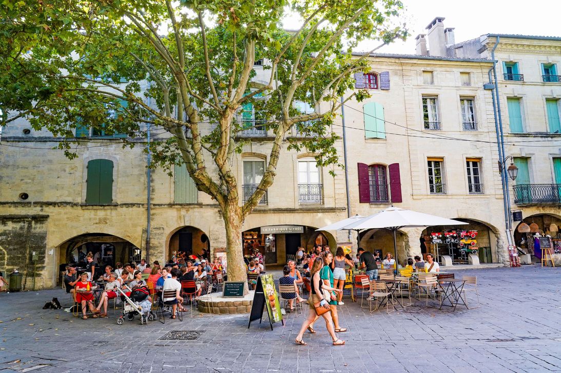 Place aux Herbes — the historic main square in Uzès, which is located in Southern France’s Occitanie region.