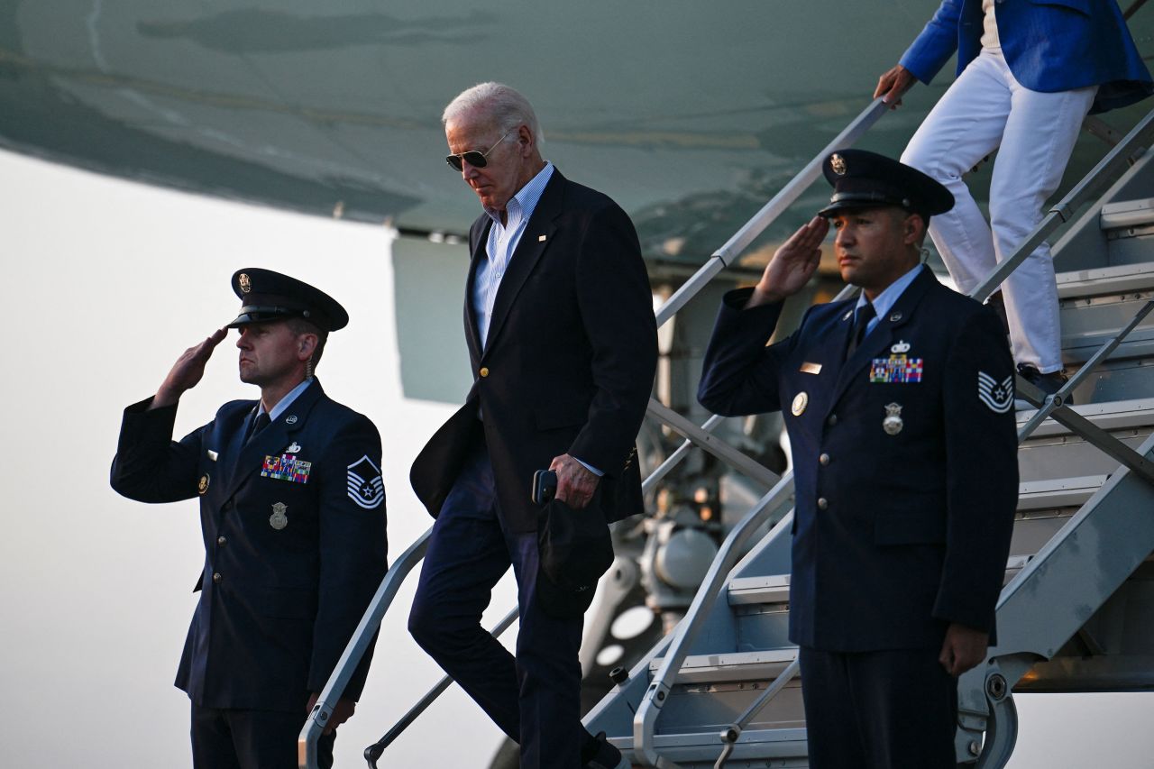 President Joe Biden disembarks from Air Force One at Dover Air Force Base prior to departure for Rehoboth Beach in Delaware on August 25. 