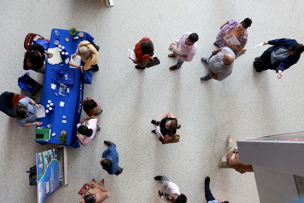 Job seekers attends the JobNewsUSA.com South Florida Job Fair held at the Amerant Bank Arena on June 26 in Sunrise, Florida.?