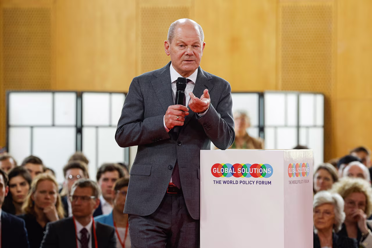 German Chancellor Olaf Scholz speaks on stage during the Global Solutions Summit in Berlin, on May 15.